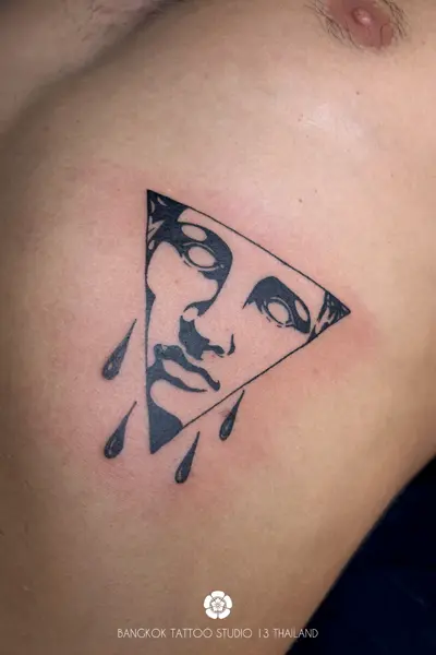 black-ink-tattoo-triangle-face-greek