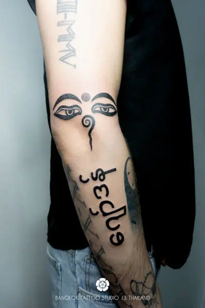 black-ink-tattoo-buddha-eyes