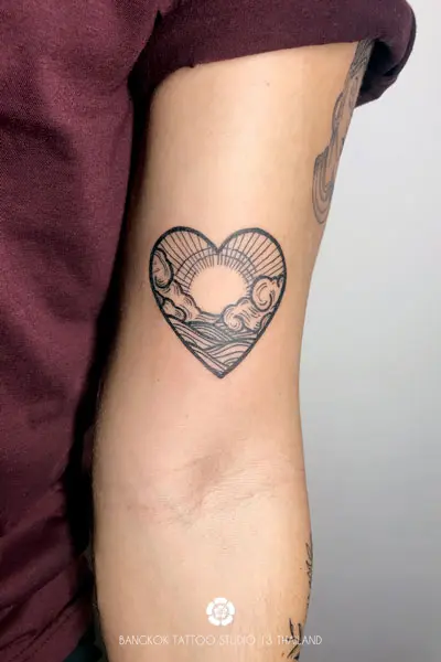 black-ink-tattoo-heart-waves-sun