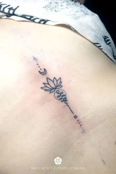 minimalist-fine-line-tattoo-sak-yant-unalome-lotus