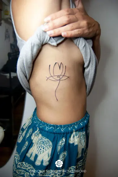 abstract-tattoo-lotus-flower-ribs-bangkok
