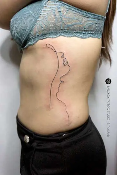 abstract-one-line-women-and-men-kiss-tattoo-bangkok
