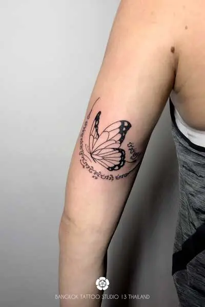 sak-yant-design-butterfly-modern-tattoo