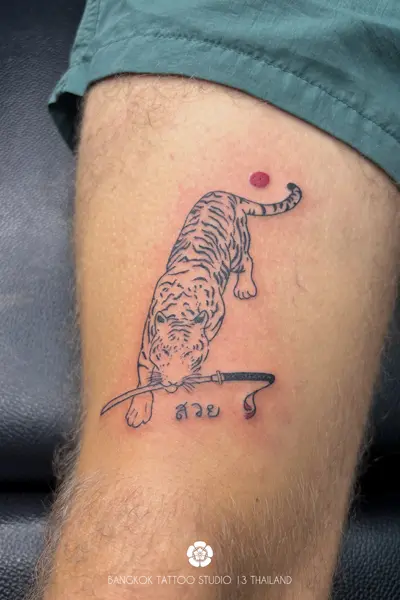black-ink-tattoo-tiger-katana-lines