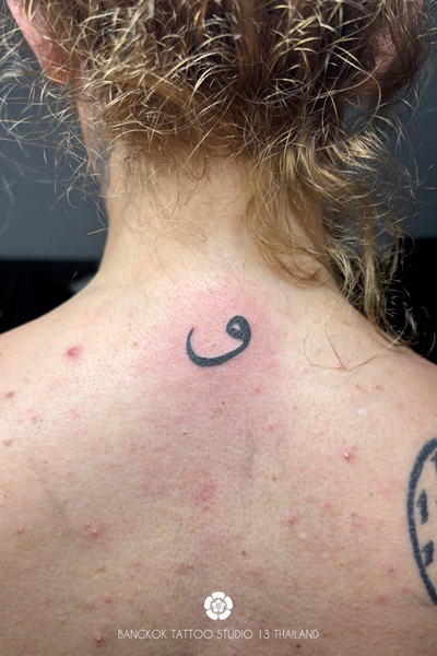 black-ink-semicolon-tattoo