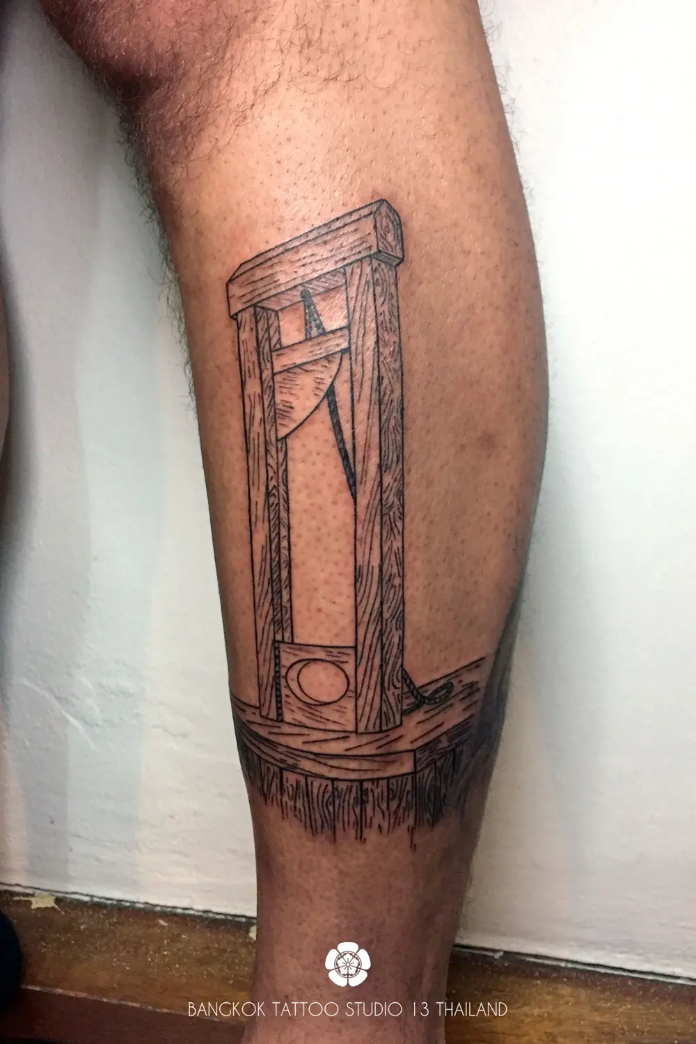 black-ink-tattoo-guillotine
