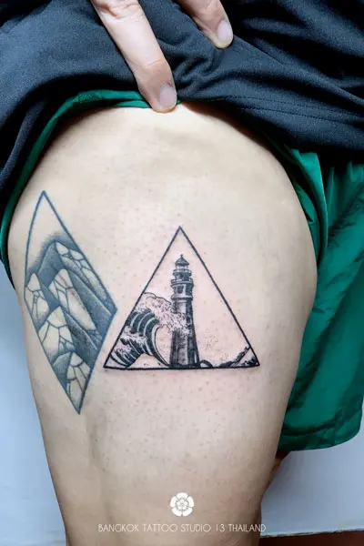 black-ink-tattoo-lighthouse-wave-hokusai