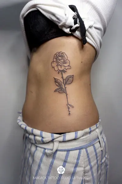 black-ink-tattoo-rose-lettering