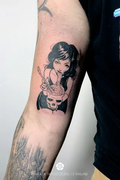 black-ink-tattoo-woman-eating-noodles-skull-bowl