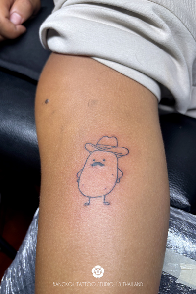 cartoon-cowboy-mr-patato-tattoo-bangkok