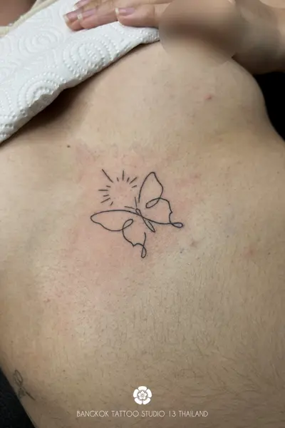minimalist-fine-line-tattoo-butterfly