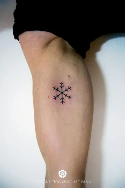 black-ink-geometric-tattoo-snowflake