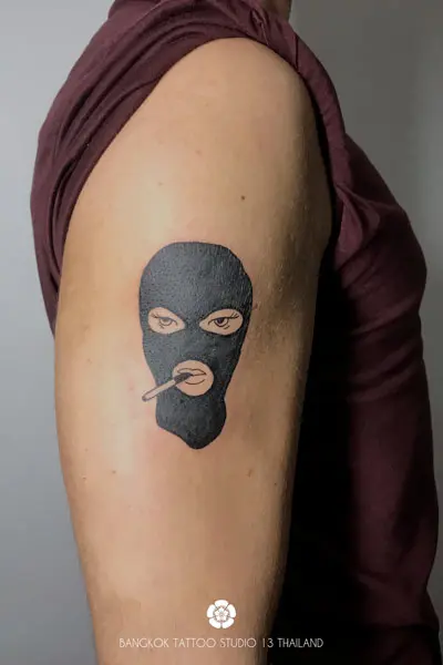 black-ink-tattoo-woman-balaclava