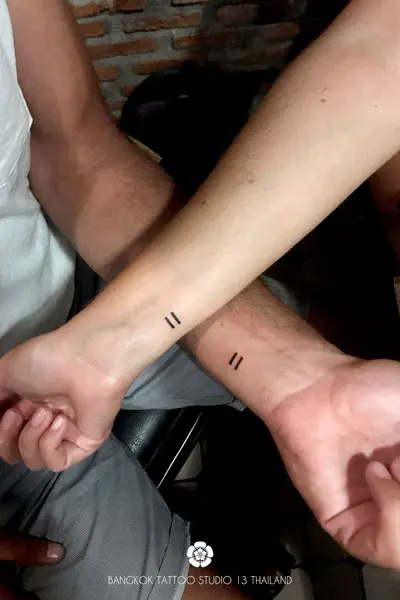 minimalist-tattoo-couple-egal-equal-wrist