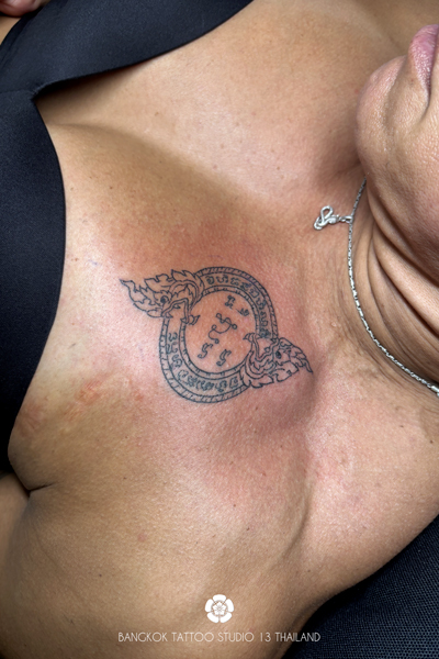 sak-yant-naga-circle-tattoo-thailand