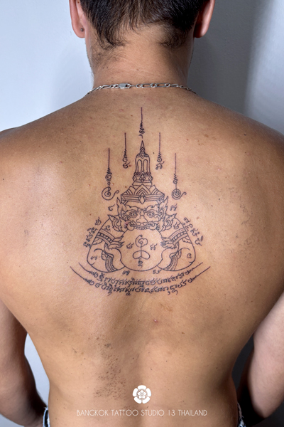 sak-yant-god-eat-moon-tattoo-thailand