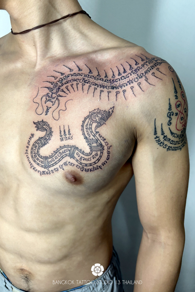 sak-yant-naga-centipede-tattoo-thailand