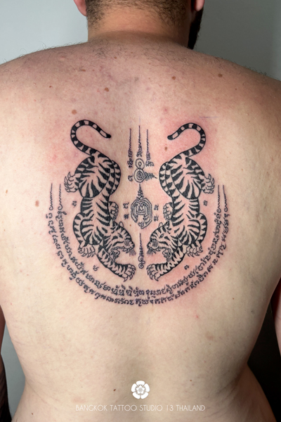 sak-yant-sue-koo-2-tigers-tattoo-thailand