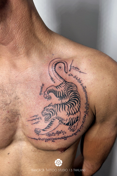 sak-yant-suea-tiger-chest-tattoo