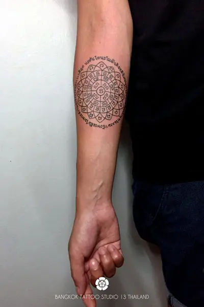 sak-yant-sun-symbol-thai-tattoo-inner-arm