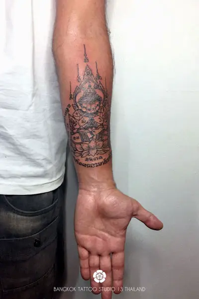 sak-yant-phra-pidta-tattoo-inner-arm