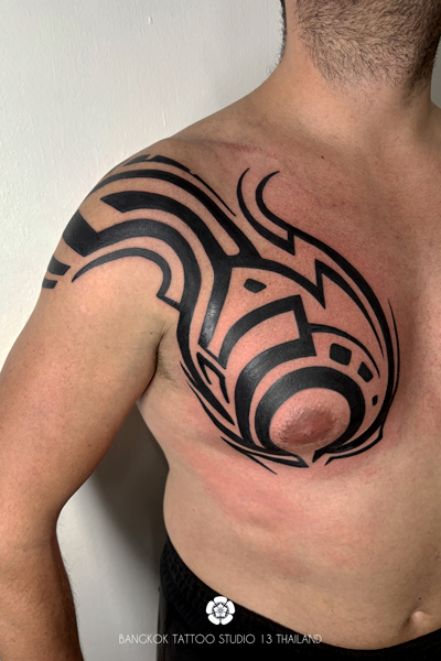black-ink-tribal-tattoo-chest